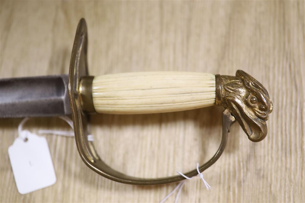An American infantry officers sword spadroon c.1800, eagle head pommel and slotted guard with traces of gilding, fluted bone